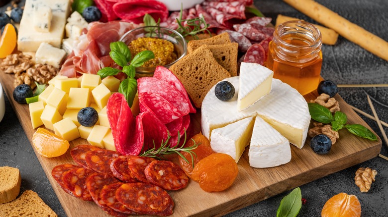 cheese, meat, and mustard board