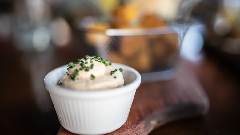 ramekin of aioli on table