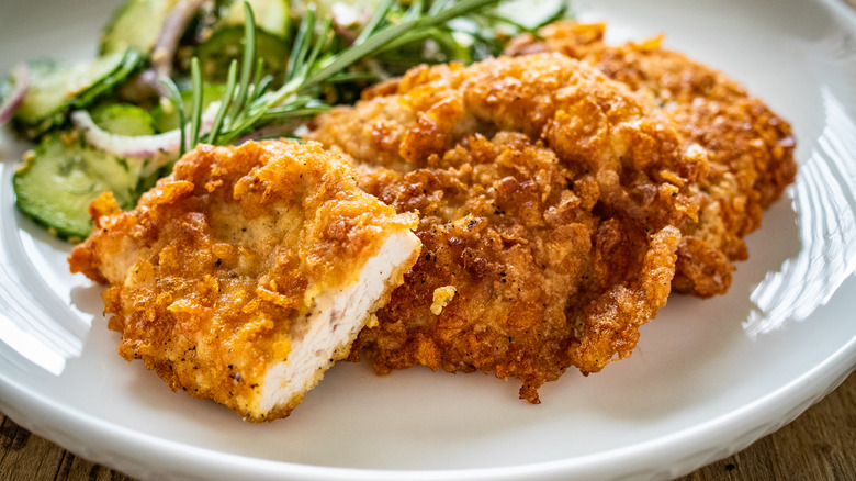 breaded chicken on white plate