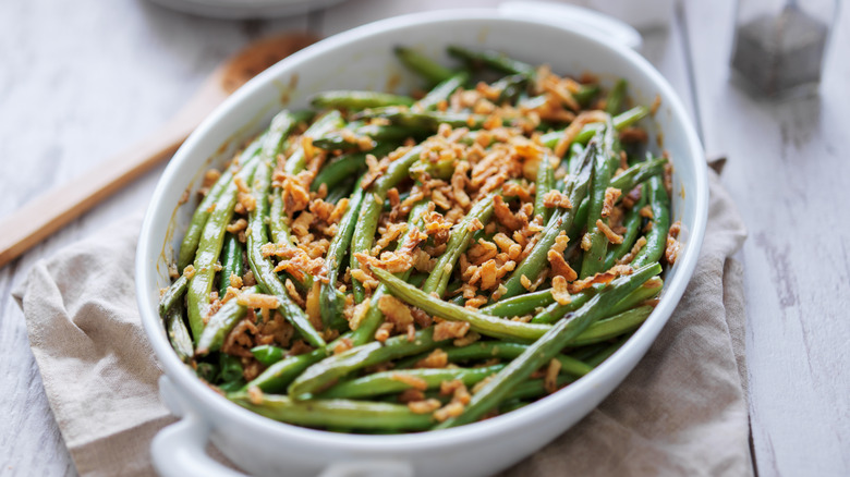 green bean casserole in white dish