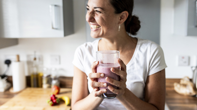 Woman enjoying smoothie