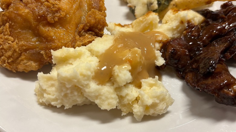 Golden Corral mashed potatoes and gravy on white plate