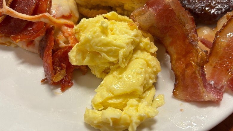 Golden Corral scrambled eggs on white plate