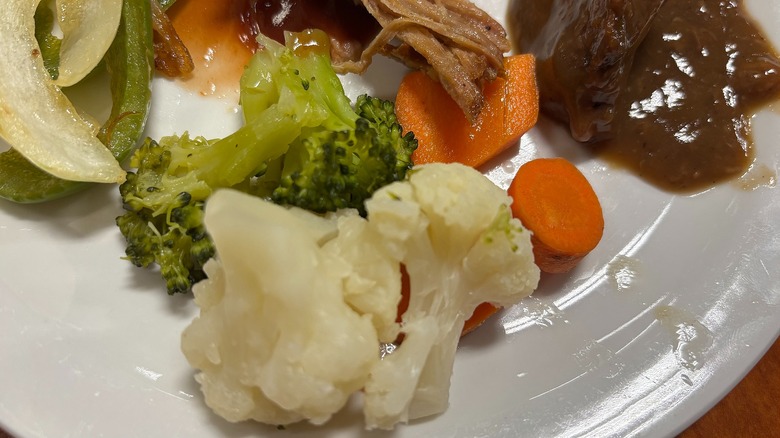 Golden Corral steamed carrots, broccoli, cauliflower on white plate