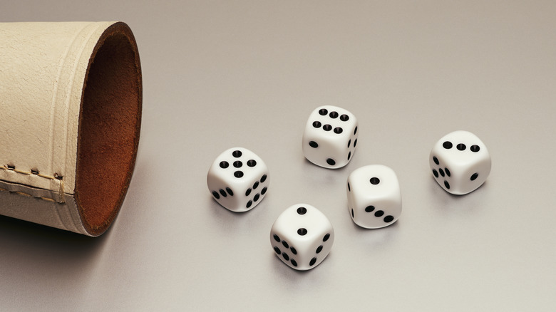 Cup rolling five dice