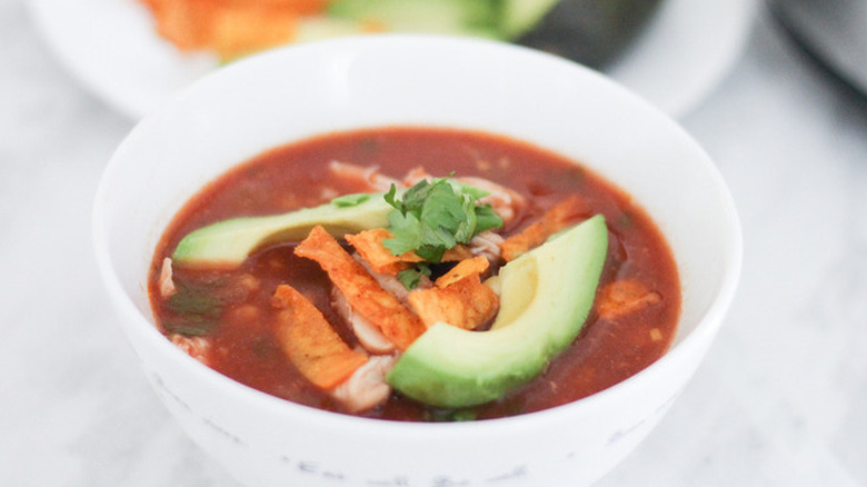 Chicken tortilla soup with avocado