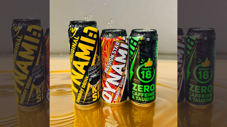 three cans of DYNAMI:T energy drink