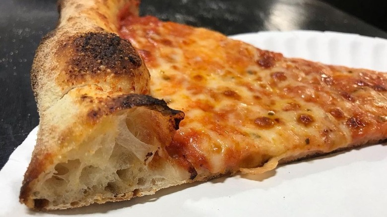 close up of cheese pizza crust