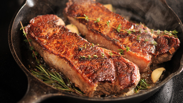 Seared steak in a cast iron pan