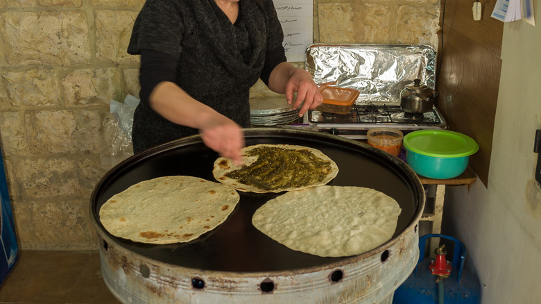 woman making manakeesh 