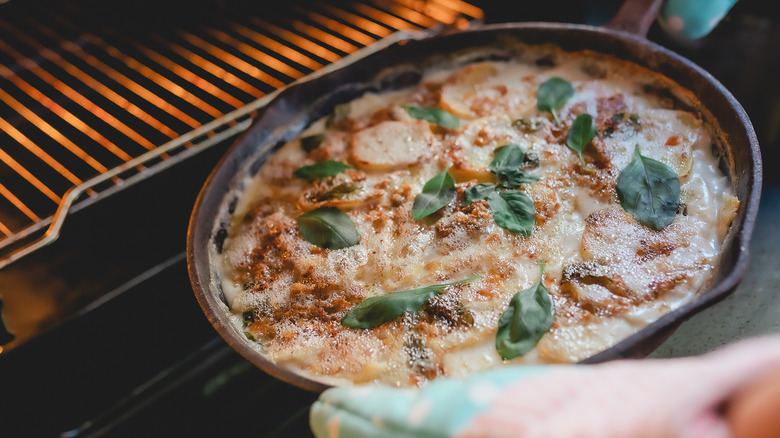 Skillet going into an oven