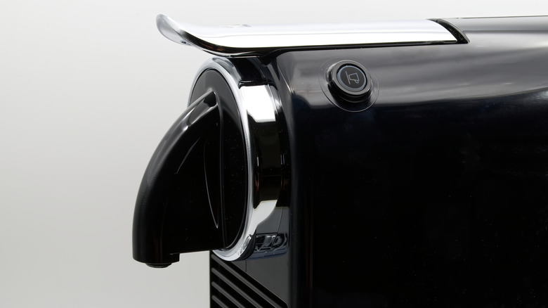 Close-up of black Nespresso machine