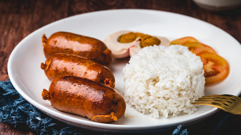 Longaniza with rice and tomatoes