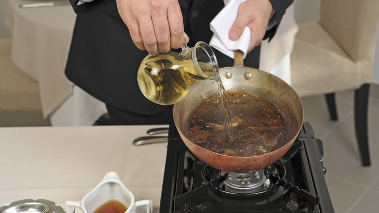 deglazing a steak pan with liquid