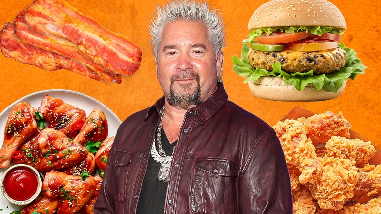 Guy Fieri surrounded by food