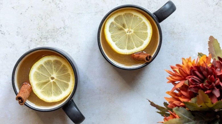 hot toddies in black mugs