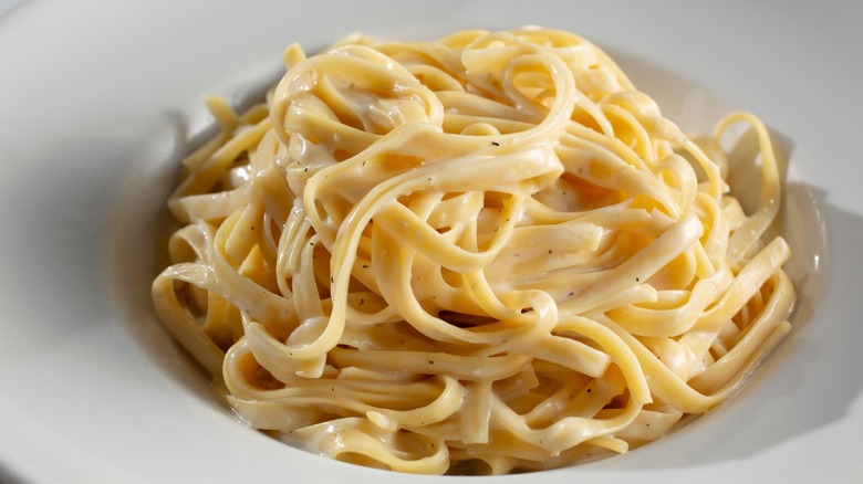 Fettuccine Alfredo in a white dish