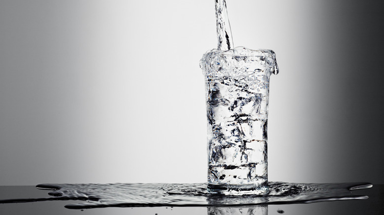 Water pouring into a glass