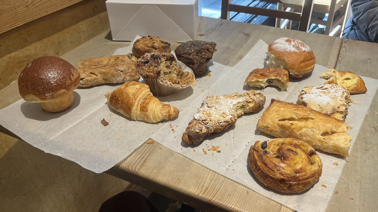 An array of pastries from Le Pain Quotidien with bites taken out of them