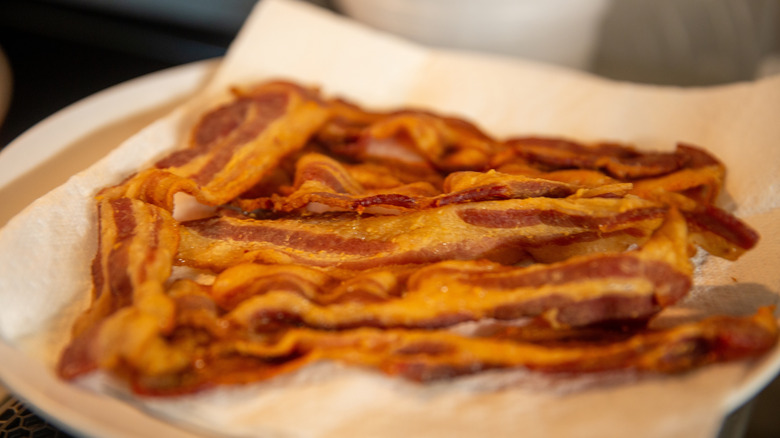 Plate of cripsy bacon on paper towel