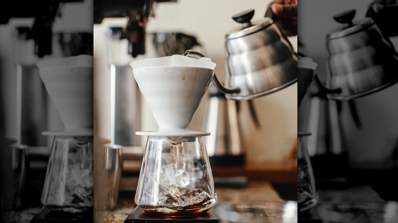 pouring hot coffee over ice