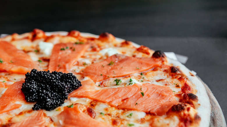 close up of a pizza with caviar