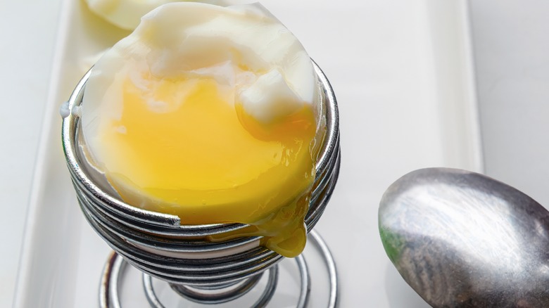 Soft-boiled egg with yolk dripping