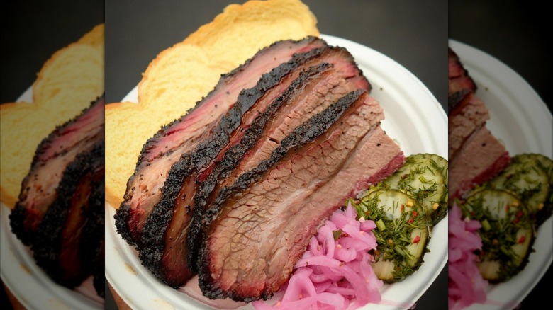 Plate of brisket, bread, pickles, and onions from Moo's