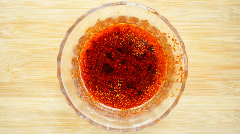 Glass bowl of chili oil