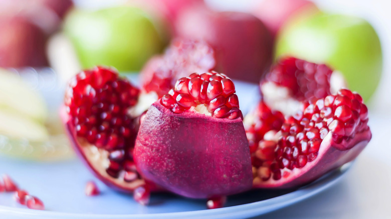 Peeled pomegranate on a plate