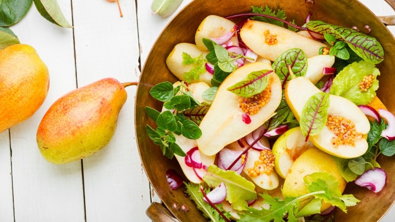 pear salad with herb garnish