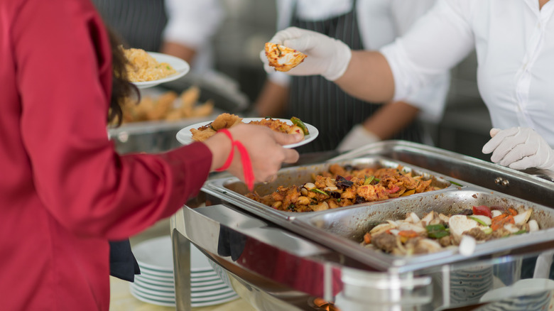 server serving at buffet