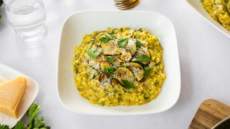 Saffron zucchini risotto in bowl