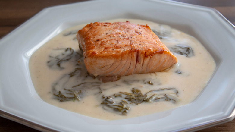 Salmon and sorrel sauce in dish