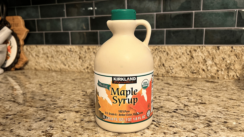 Bottle of Kirkland Signature Organic Pure Maple Syrup on kitchen counter