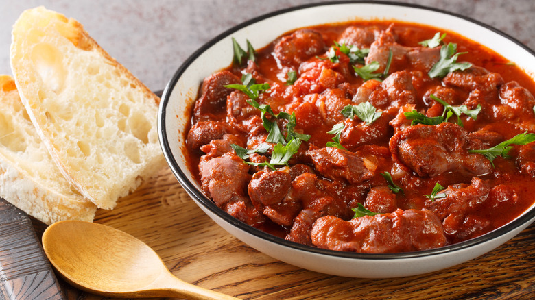 slow cooked meat in tomato sauce