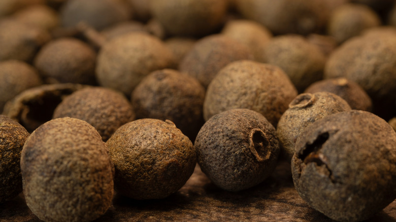 allspice close-up, pile of whole allspice, texture , macro.