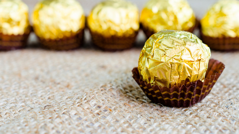 Chocolate balls in golden wrapping