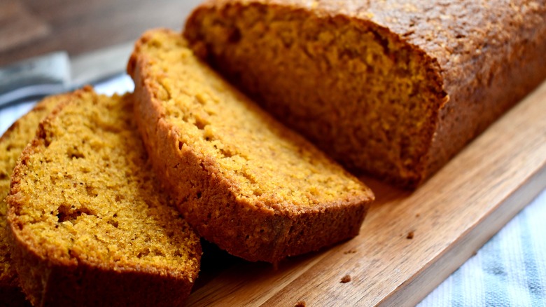 Sliced pumpkin bread on board