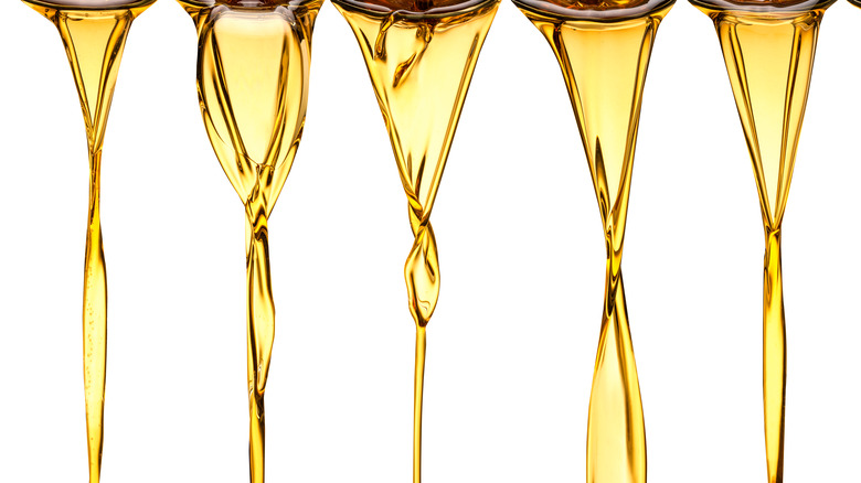 Different kinds of oils dripping