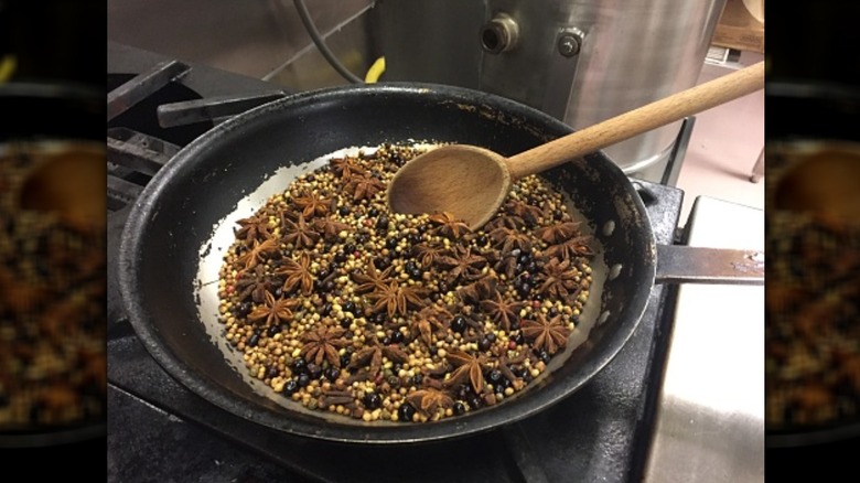 Spices toasting in pan