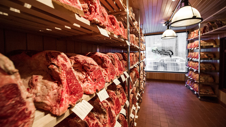 Steaks aging in a meat locker