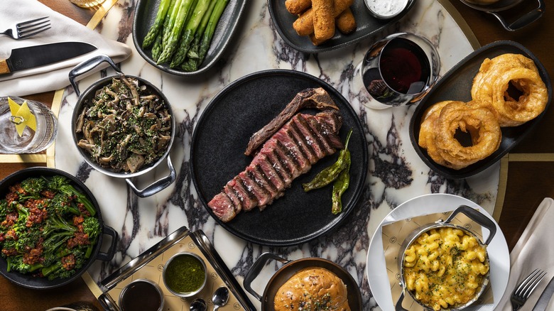 Steak and sides with wine