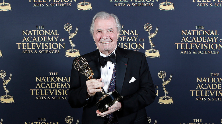 Jacques Pépin holding an Emmy