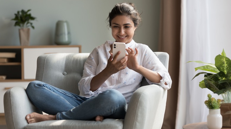 Woman using smart phone