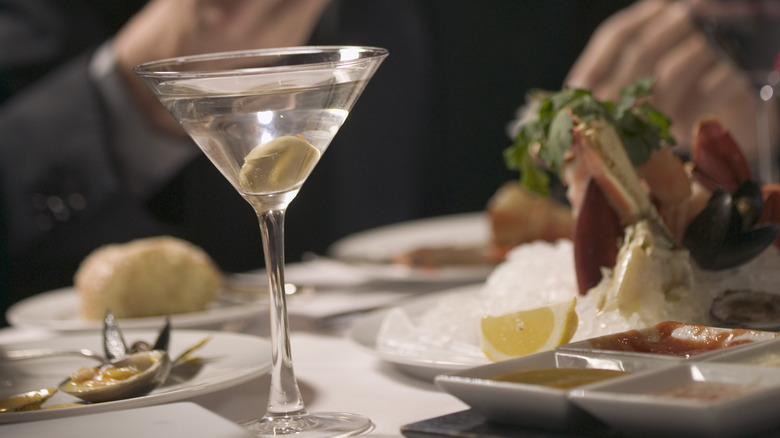 martini on table with seafood