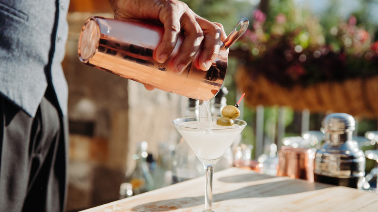 martini being poured into glass