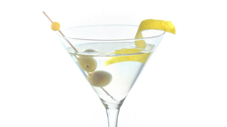 martini with twist and olives