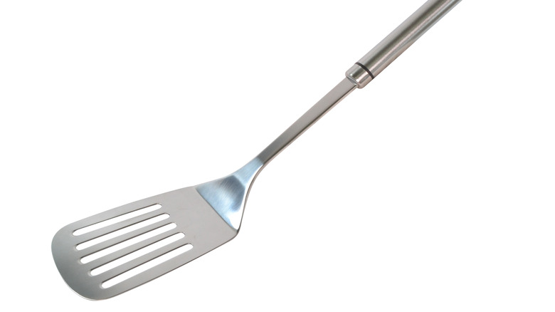 A thin slotted spatula