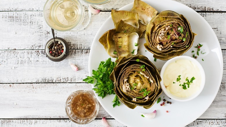 Artichokes served with garlic sauce